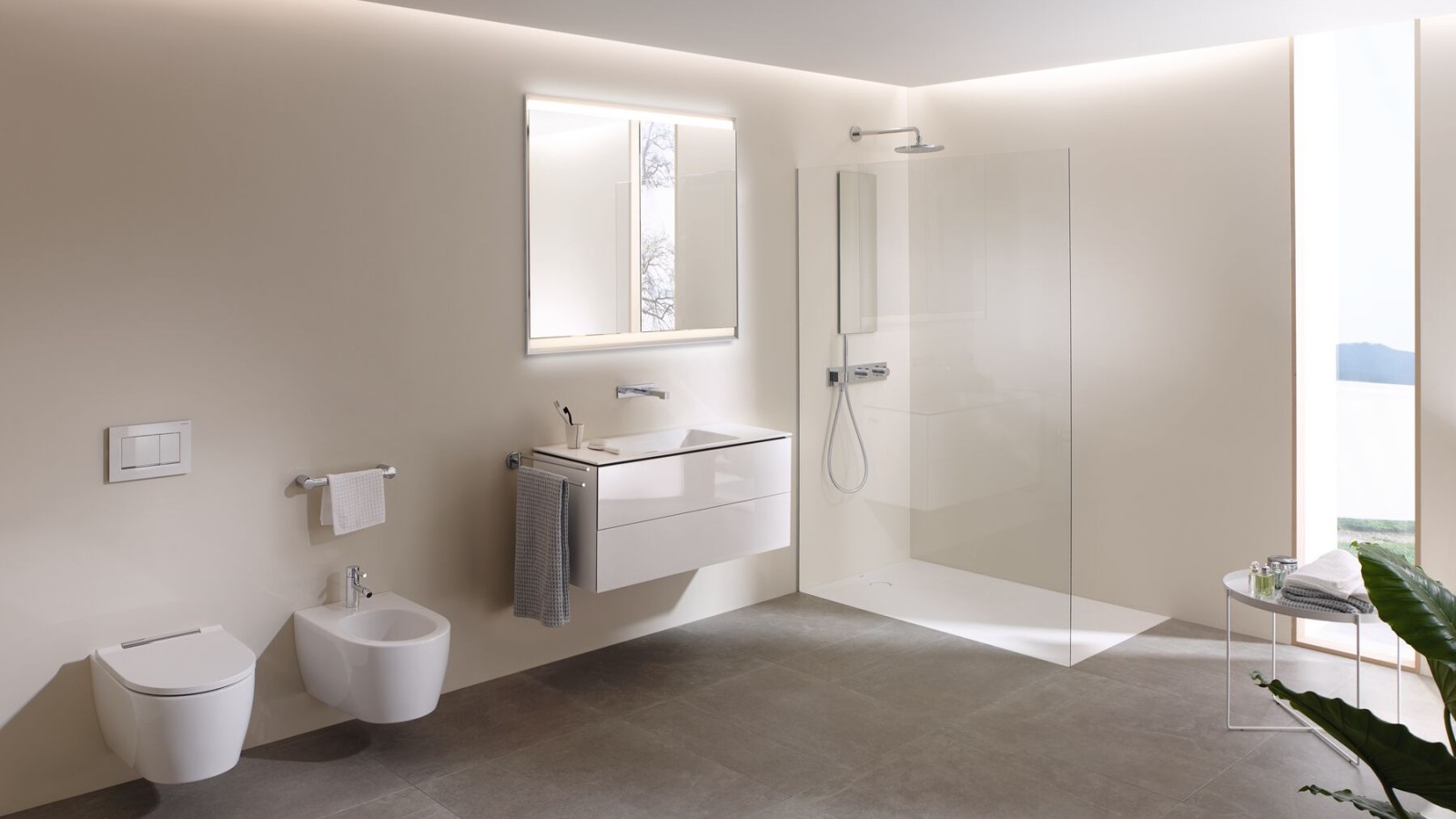 Suuri kylpyhuone, jossa on Geberit AquaClean Mera pesu-wc ja Geberit ONE -kylpyhuonekalusteet ja tuotteet (© Geberit) Suuri kylpyhuone, jossa on Geberit AquaClean Mera pesu-wc ja Geberit ONE -kylpyhuonekalusteet ja tuotteet (© Geberit)