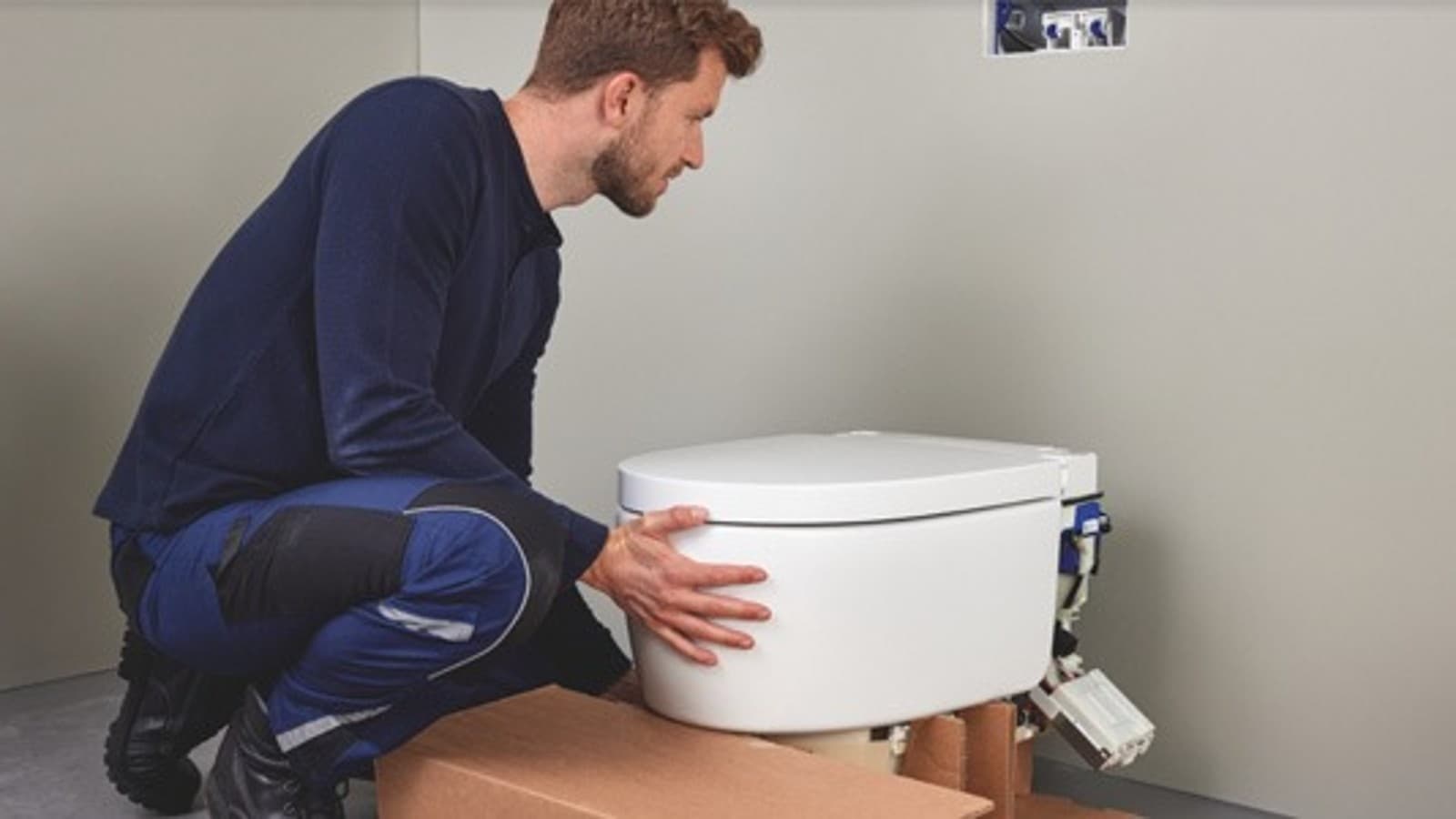 Geberit AquaClean pesu-wc:n asennus Geberit AquaClean pesu-wc:n asennus